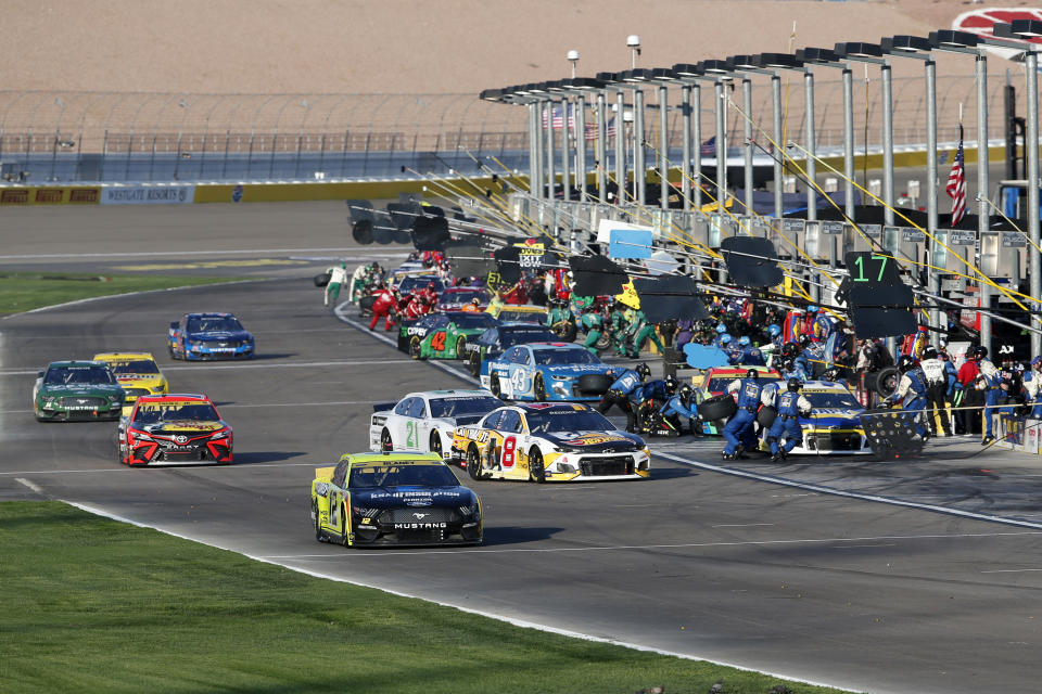 Drivers head into pit row during a NASCAR Cup Series auto race at Las Vegas Motor Speedway, Sunday, Sept. 26, 2021, in Las Vegas. (AP Photo/Steve Marcus)