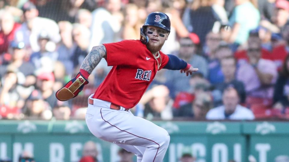 Boston Red Sox right fielder Alex Verdugo (99) is caught in a rundown in the third inning against the Kansas City Royals at Fenway Park.