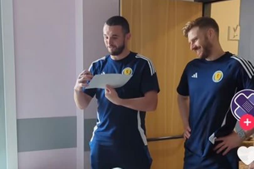 Super John and Stuart Armstrong at the hospital.