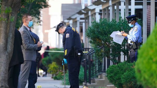 PHOTO: Investigators work the scene where multiple people were shot including police officers in Philadelphia, Oct. 12, 2022. (Matt Rourke/AP)