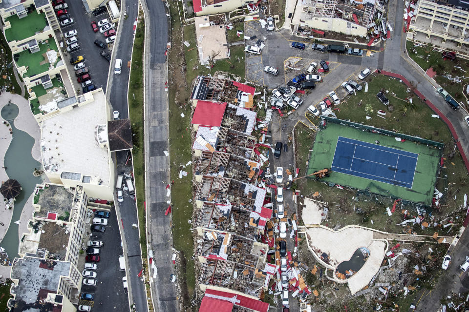 <p>Storm damage in the aftermath of Hurricane Irma, in St. Maarten. Irma cut a path of devastation across the northern Caribbean, leaving thousands homeless after destroying buildings and uprooting trees on Sept. 6, 2017. (Photo: Gerben Van Es/Dutch Defense Ministry via AP) </p>