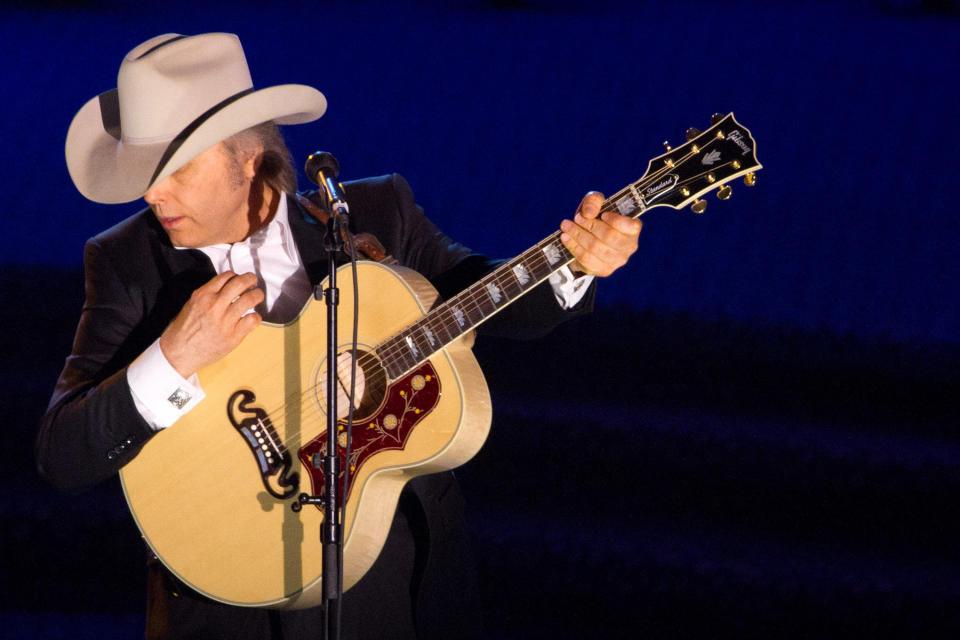 FILE - A June 16, 2011 file photo shows country singer Dwight Yoakam performing at the 42nd Annual Songwriters Hall of Fame Awards in New York. Yoakam's first album in his return to Warner Bros. Records comes out Sept. 18, 2012. (AP Photo/Charles Sykes, file)