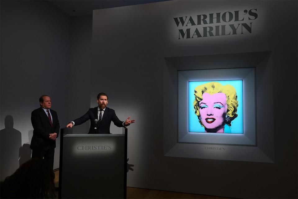 Christie’s Americas chairman Marc Porter (L) looks on as Christie's chairman, 20th and 21st Century Art, Alex Rotter announces that Christie's will offer Andy Warhol’s Shot Sage Blue Marilyn painting of Marilyn Monroe during its May Marquee Week of sales at Christie’s on March 21, 2022 in New York City. The work comes to Christie’s from the Thomas and Doris Ammann Foundation Zurich and all proceeds of the sale will benefit the foundation