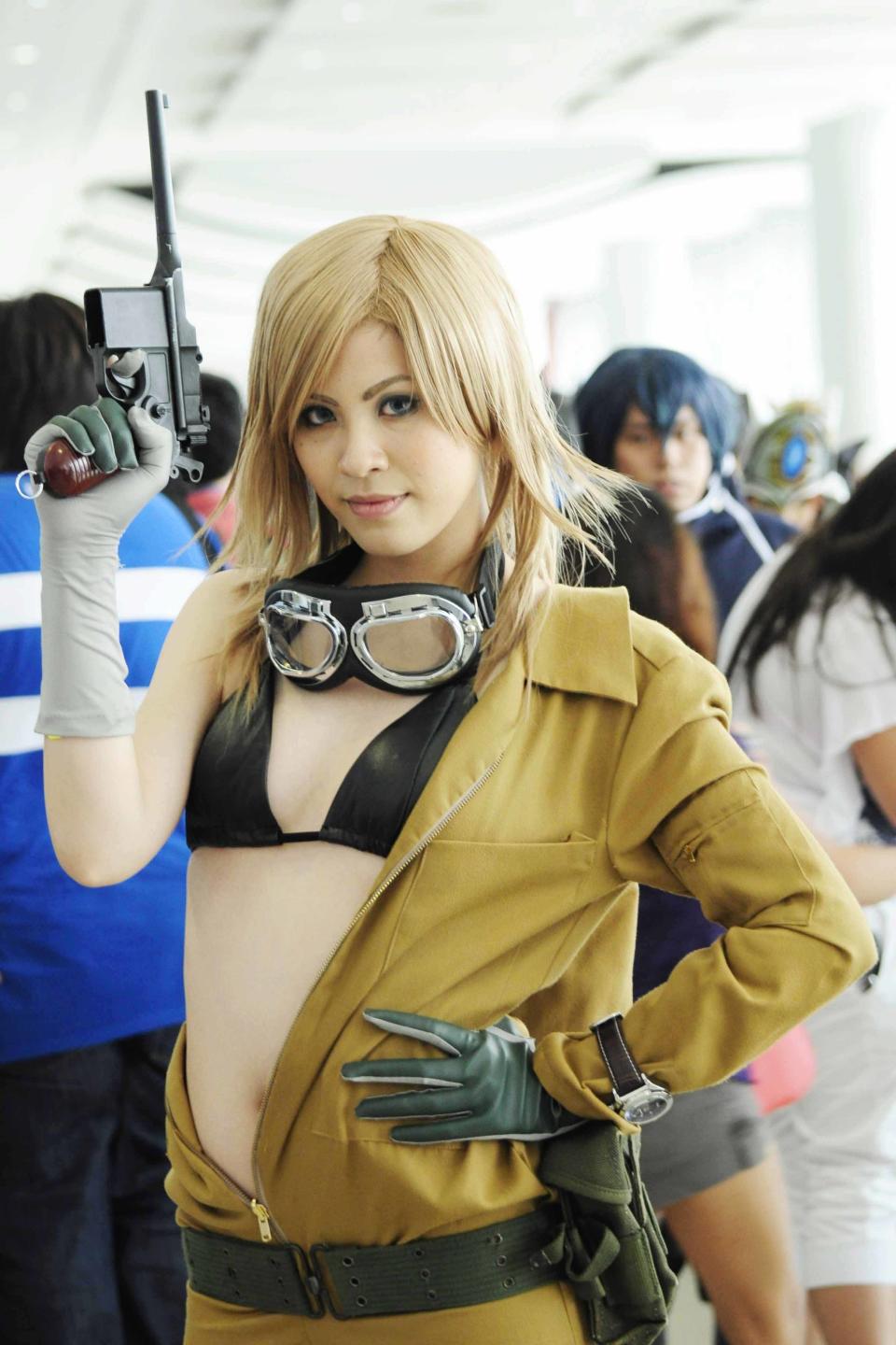 All dressed up! A cosplay enthusiast stikes a pose during the Cosplay Mania 2012 held at the SMX Convention Center in Pasay City, Metro Manila on 29 September 2012. (Angela Galia/NPPA images)