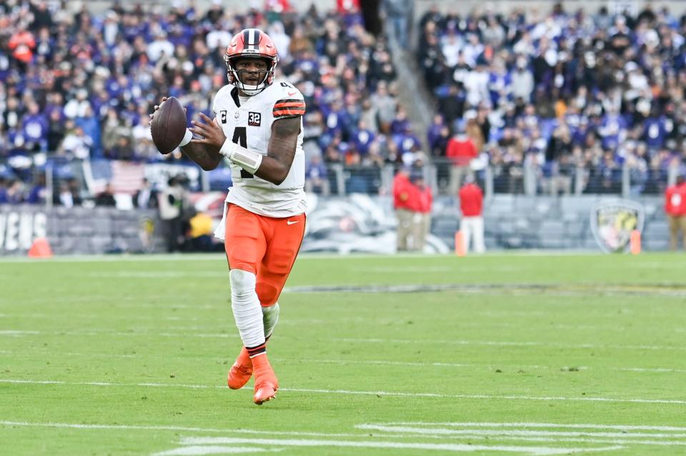 Cleveland Browns quarterback Deshaun Watson (4) throws on the run during the second half against the Baltimore Ravens on Nov. 12, 2023, in Baltimore.