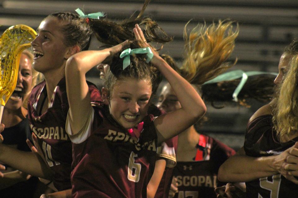 Episcopal players jump in celebration after defeating Ponte Vedra 14-13 in the FHSAA Region 1-1A high school girls lacrosse final on May 3, 2024. [Clayton Freeman/Florida Times-Union]