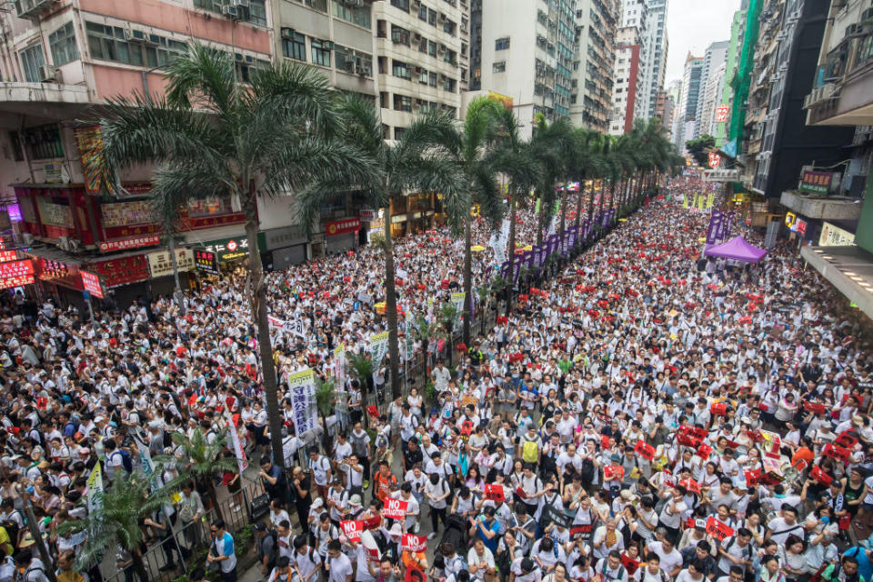 Demonstrators march during a protest against a proposed extradition law in Hong Kong, China, on Sunday, June 9, 2019.<span class="copyright">Paul Yeung/Bloomberg via Getty Images</span>