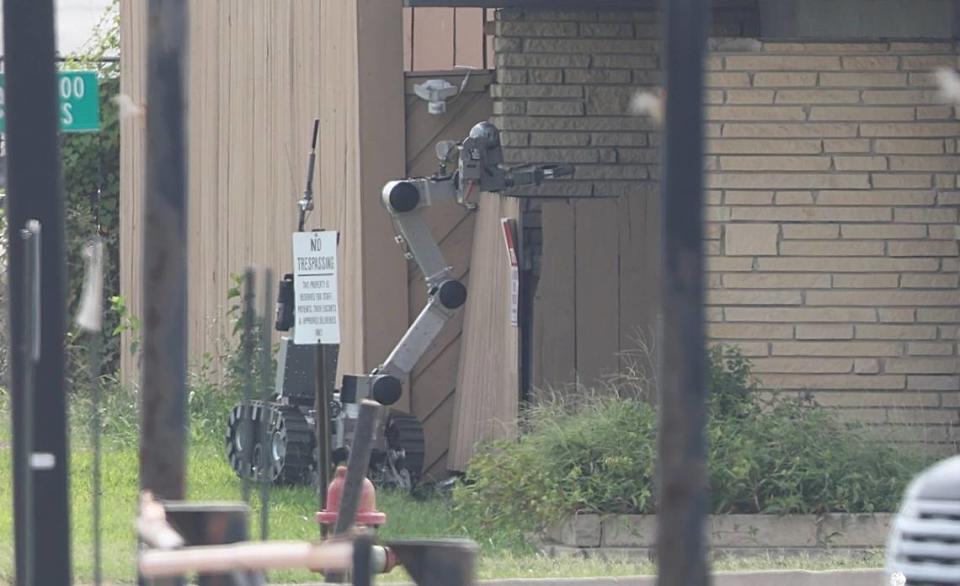 The Wichita police bomb squad investigate a “suspicious device” in the 5100 block of East Kellogg Drive.