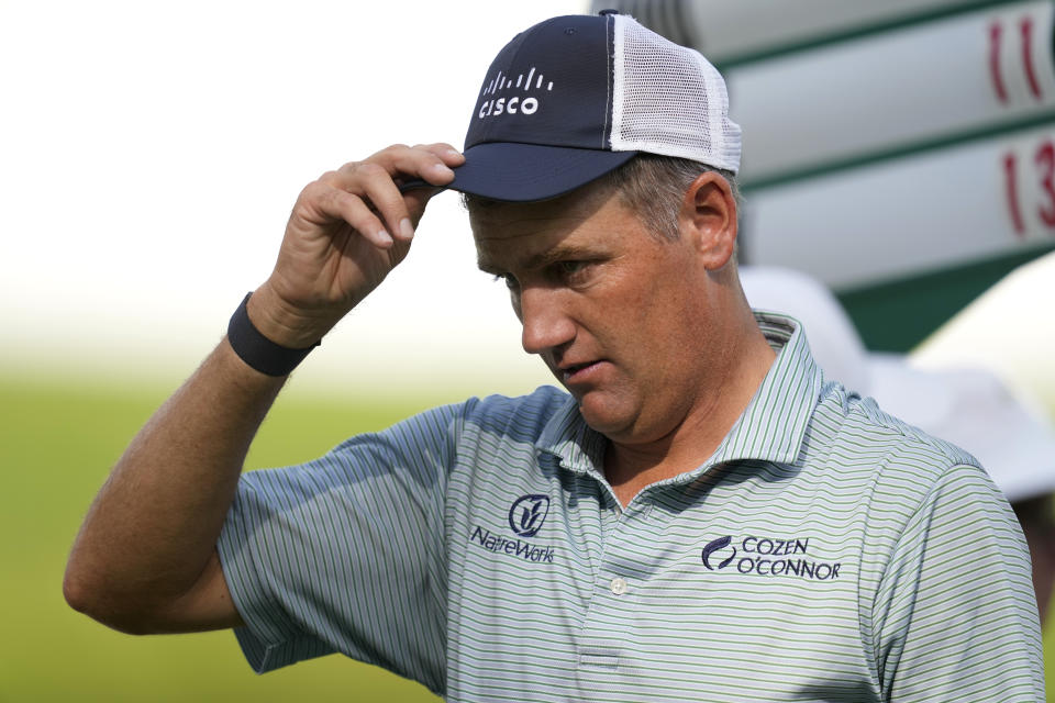 Brendon Todd walks off the 18th green after finishing his third round of the John Deere Classic golf tournament, Saturday, July 8, 2023, at TPC Deere Run in Silvis, Ill. (AP Photo/Charlie Neibergall)