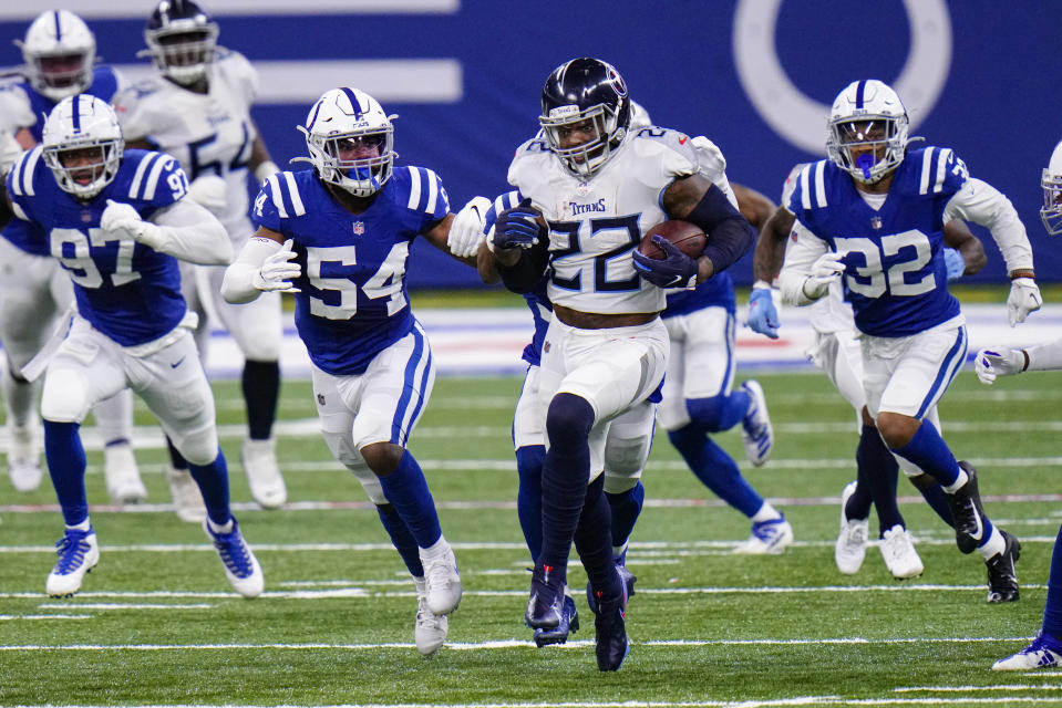 Tennessee Titans running back Derrick Henry (22) runs against the Tennessee Titans in the first half of an NFL football game in Indianapolis, Sunday, Nov. 29, 2020. (AP Photo/AJ Mast)