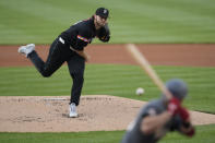 Baltimore Orioles pitcher Corbin Burnes (39) delivers to Washington Nationals outfielder Jacob Young (30) during the first inning of a baseball game at Nationals Park in Washington, Tuesday, May 7, 2024. (AP Photo/Susan Walsh)