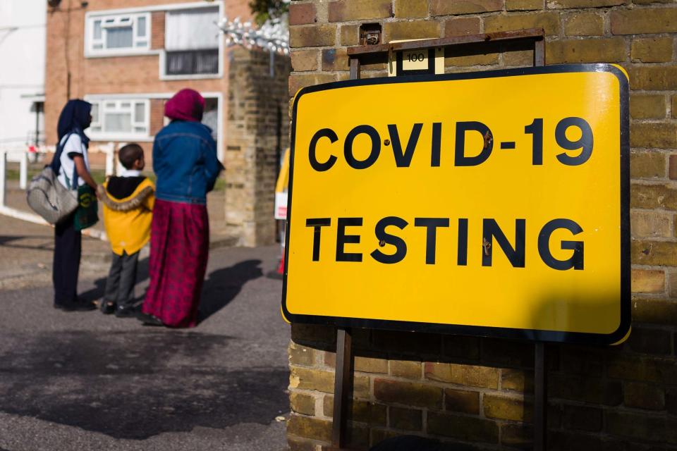 Signs direct members of the public to a Covid-19 testing centre in east London (Getty Images)