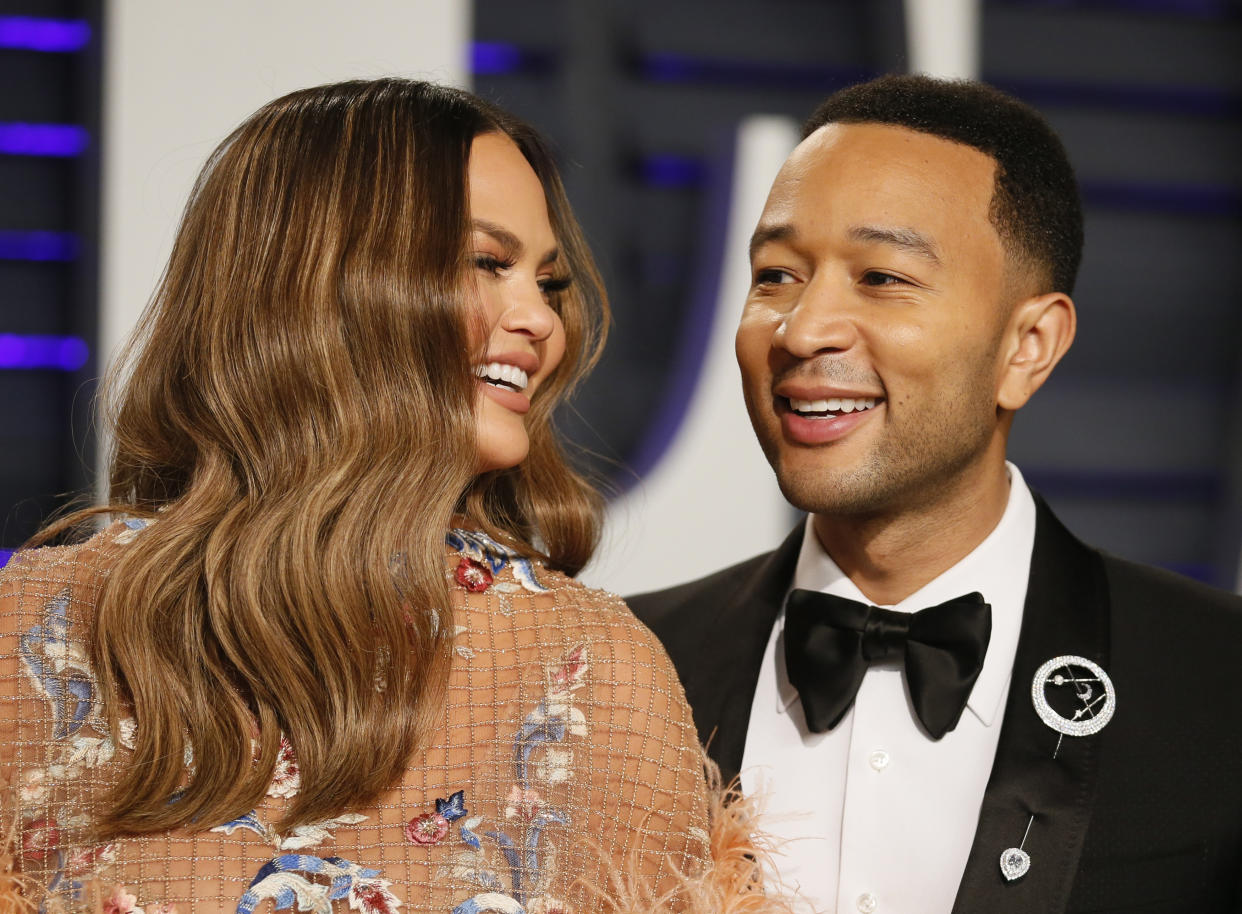 91st Academy Awards – Vanity Fair – Beverly Hills, California, U.S., February 24, 2019 – John Legend and Chrissy Teigen. REUTERS/Danny Moloshok