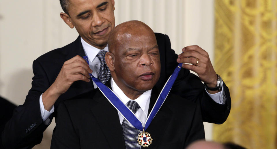 President Barack Obama presents a 2010 Presidential Medal of Freedom to U.S. Rep. John Lewis, D-Ga., during a ceremony in the East Room of the White House in Washington. Lewis, who carried the struggle against racial discrimination from Southern battlegrounds of the 1960s to the halls of Congress, died Friday, July 17, 2020.