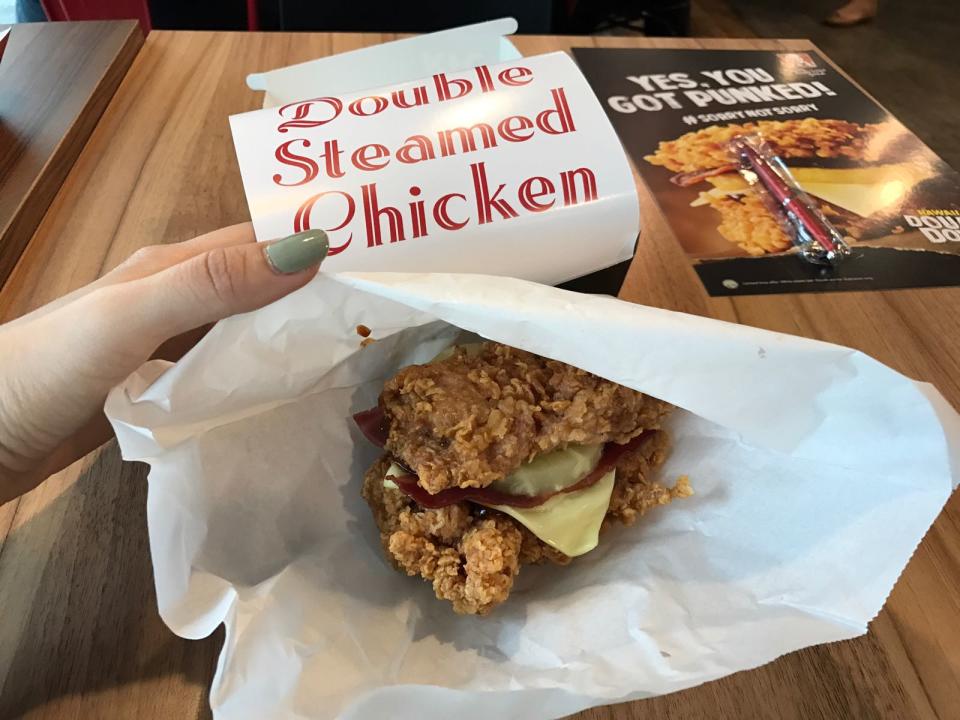 KFC revealed to the media on Thursday (18 August) the actual promotional food item, the Zinger Double Down Burger. (Photo: Elizabeth Tong/ Yahoo Lifestyle Singapore)