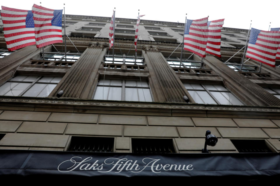 U.S. flags fly outside of Saks Fifth Avenue in New York, U.S., June 19, 2017. REUTERS/Lucas Jackson