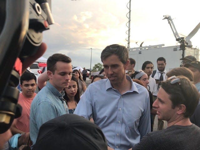 Former U.S. Rep. Beto O'Rourke visits the memorial for the victims of the mass shooting at an El Paso Walmart on Aug. 7, 2019.