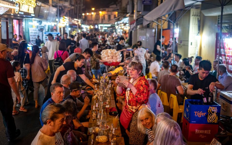 'A frenzy of traffic, markets, lights and street food': the Old Quarter in Hanoi