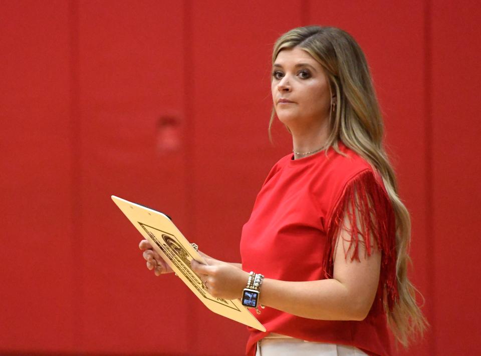 Lubbock-Cooper Liberty's head volleyball coach Katelyn Anderson coaches during the match against Friona, Tuesday, Aug. 8, 2023, at Laura Bush Middle School.