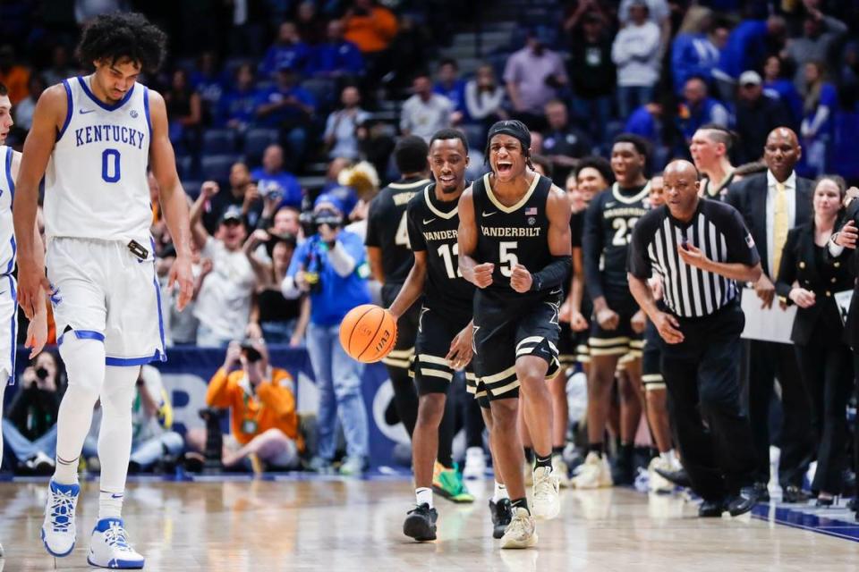 Vanderbilt guard Ezra Manjon (5) celebrated after scoring a season-high 25 points to lead the Commodores to an 80-73 upset of No. 23 Kentucky in the 2023 SEC Tournament quarterfinals in Nashville.