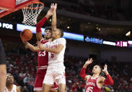 Nebraska's Bryce McGowens (5) shoots against Indiana's Trayce Jackson-Davis (23) and Parker Stewart (45) during the first half of an NCAA college basketball game Monday, Jan. 17, 2022, in Lincoln, Neb. (AP Photo/Rebecca S. Gratz)