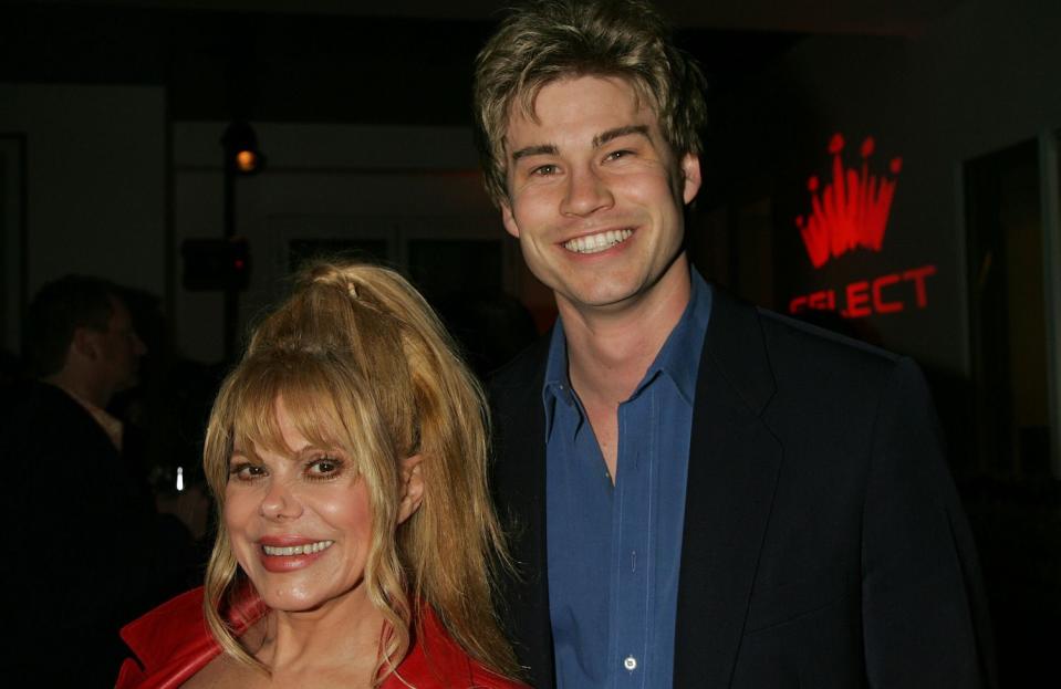 <p>David Livingston/Getty</p> Charo and her son, Shel, in 2006