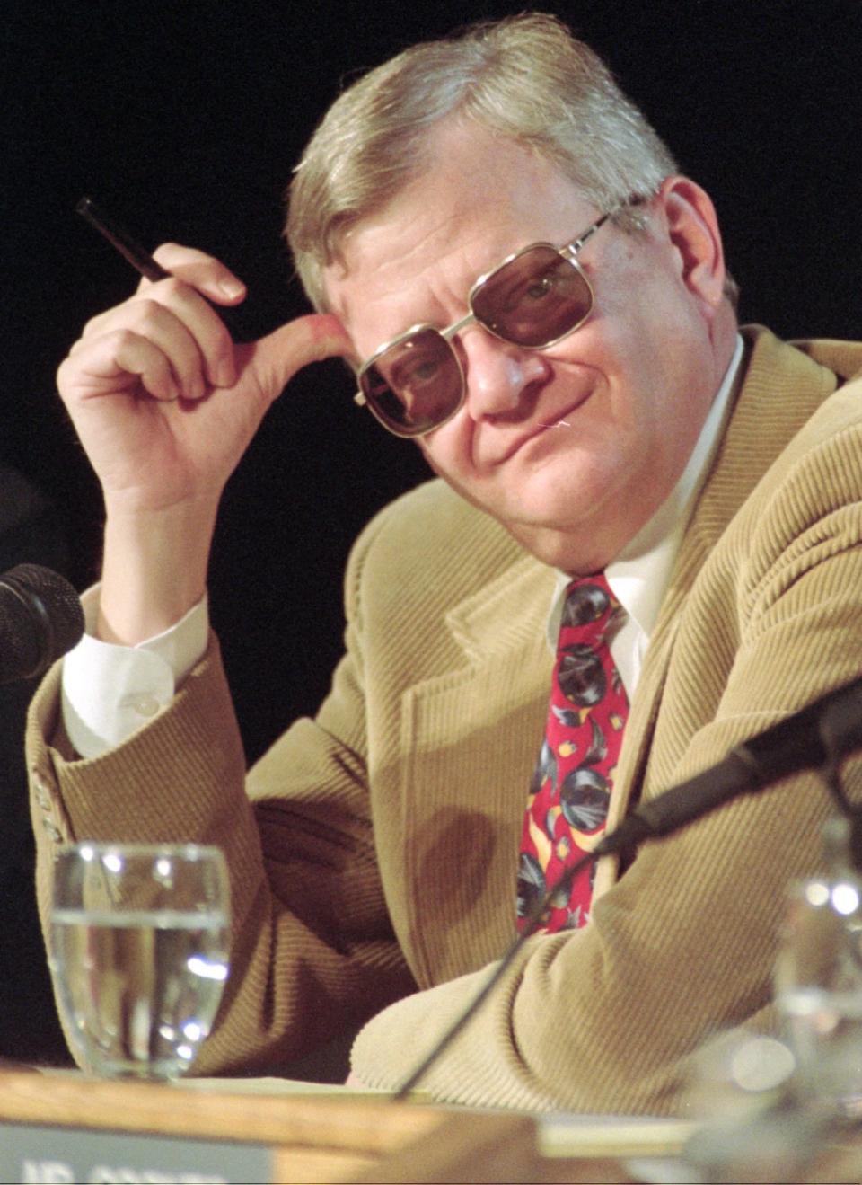 Noted author Tom Clancy listens during a panel discussion at Norwich University in Northfield on April 17, 1997. Clancy was on a panel of noted military writers discussing the topic " Military Fiction in America: The Craft and Its Influence."