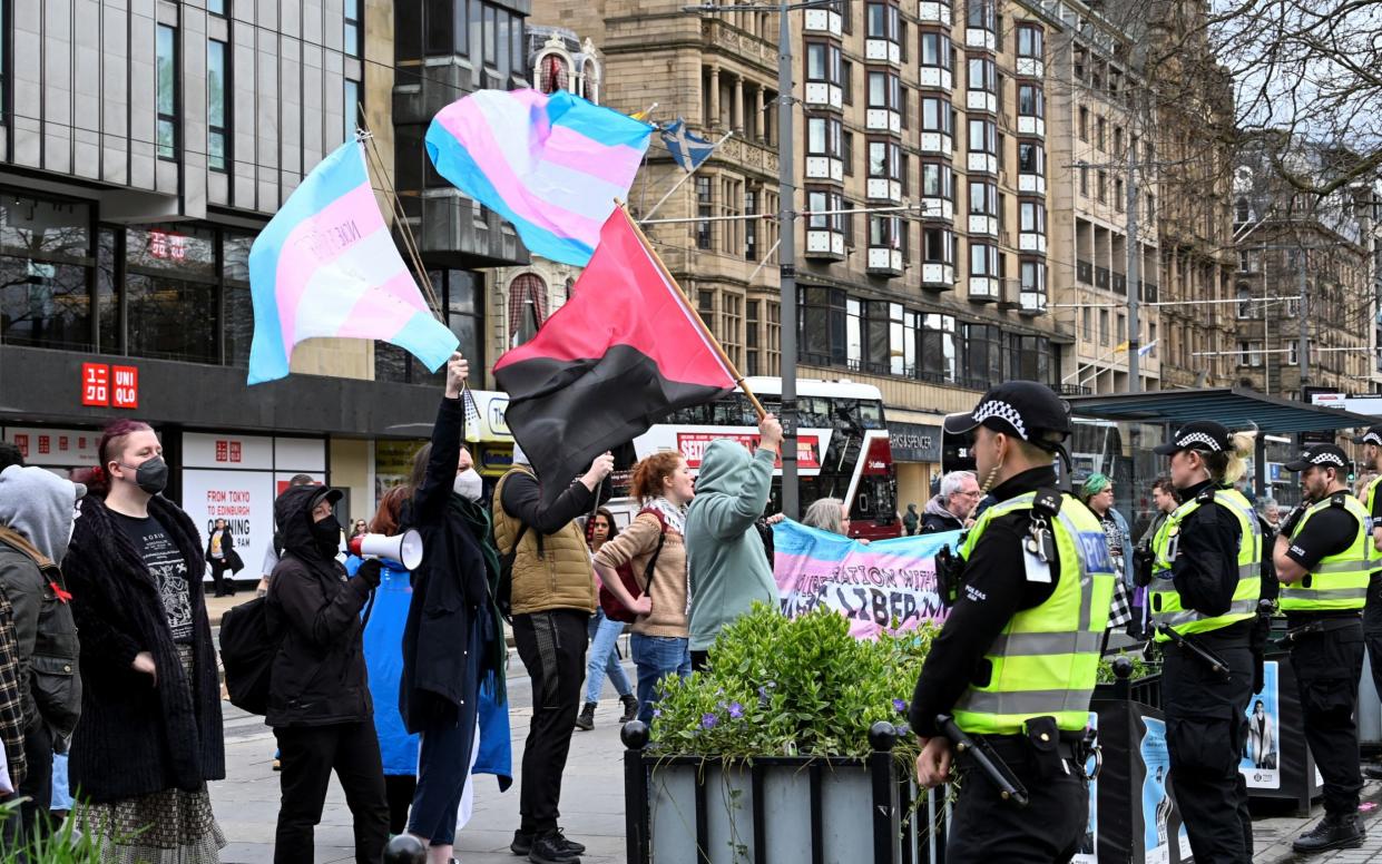 Trans rights protesters disrupt a rally entitled Let Women Speak, outside the Royal Scottish Academy in Edinburgh