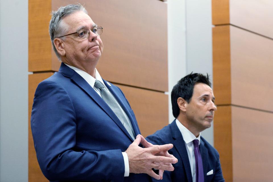 Former Marjory Stoneman Douglas High School School Resource Officer Scot Peterson, left, and his defense attorney Mark Eiglarsh stand as they are introduced to potential jurors during jury selection in the case of at the Broward County Courthouse in Fort Lauderdale on Monday, June 5, 2023.