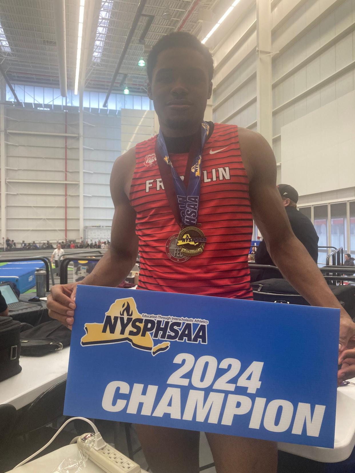 Perrion Williams, a senior at World of Inquiry who sprints with the Franklin indoor track team that is merged with athletes at other schools in the Rochester City School District.