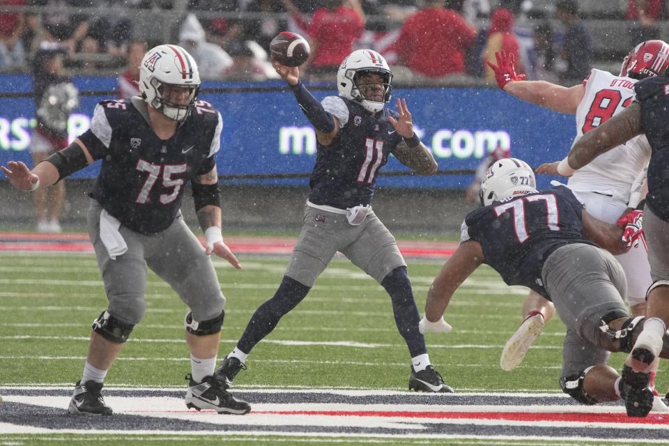 Arizona quarterback Noah Fifita (11) throws the ball against Utah during the second half of an NCAA college football game, Saturday, Nov. 18, 2023, in Tucson, Ariz. | Rick Scuteri, Associated Press