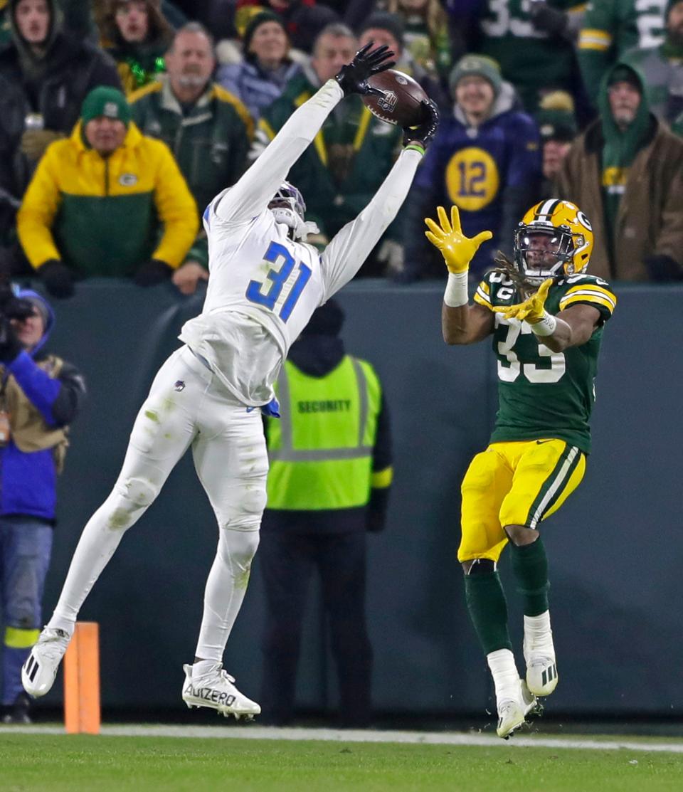 Detroit Lions safety Kerby Joseph (31) breaks up a pass intended for Green Bay Packers running back Aaron Jones (33) during their football game on Sunday, January, 8, 2022 at Lambeau Field in Green Bay, Wis. Wm. Glasheen USA TODAY NETWORK-Wisconsin