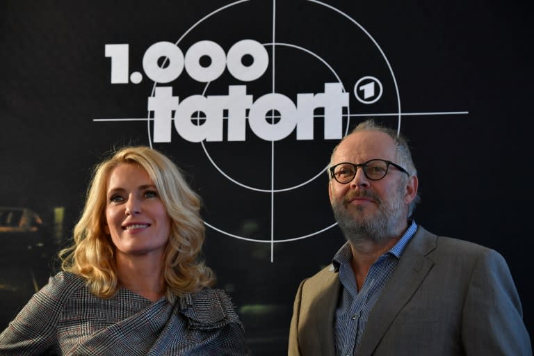 Actors Maria Furtwaengler and Alex Milberg pose for photographers during a presentation to the press of the 1,000th episode of popular German TV crime drama "Tatort"