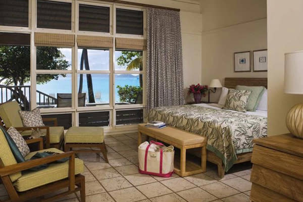 <div class="caption-credit"> Photo by: Rosewood Hotels</div><div class="caption-title">3. Premium Ocean View Room At Caneel Bay, A Rosewood Resort, In St. John, U.S.V.I.</div><p> While technically not a suite, these ultra-private cottage-like accommodations are so spacious and set in a way that they feel so remote, they needed to make the list. Old-school levered windows and overhead fans keep the oceanview rooms breezy and comfortable, as do the rattan furnishings. Large stone patios are shaded by lush tropical foliage to ensure the ultimate privacy and feature chaise loungers that look out onto the sea. For more info, visit <a rel="nofollow noopener" href="http://www.bridalguide.com/planning/wedding-reception/fall-wedding-ideas" target="_blank" data-ylk="slk:rosewoodhotels.com/en/caneelbay;elm:context_link;itc:0;sec:content-canvas" class="link ">rosewoodhotels.com/en/caneelbay</a>. </p> <p> <b>Related: <a rel="nofollow noopener" href="http://www.bridalguide.com/honeymoons/caribbean/caribbean-honeymoons-for-every-budget" target="_blank" data-ylk="slk:Caribbean Honeymoons for Every Budget;elm:context_link;itc:0;sec:content-canvas" class="link ">Caribbean Honeymoons for Every Budget</a></b> </p>