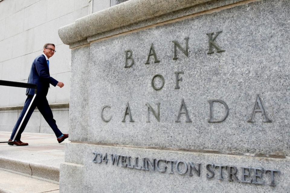 Central bank governor Tiff Macklem walks outside the Bank of Canada building in Ottawa, Ont., on June 22, 2020.