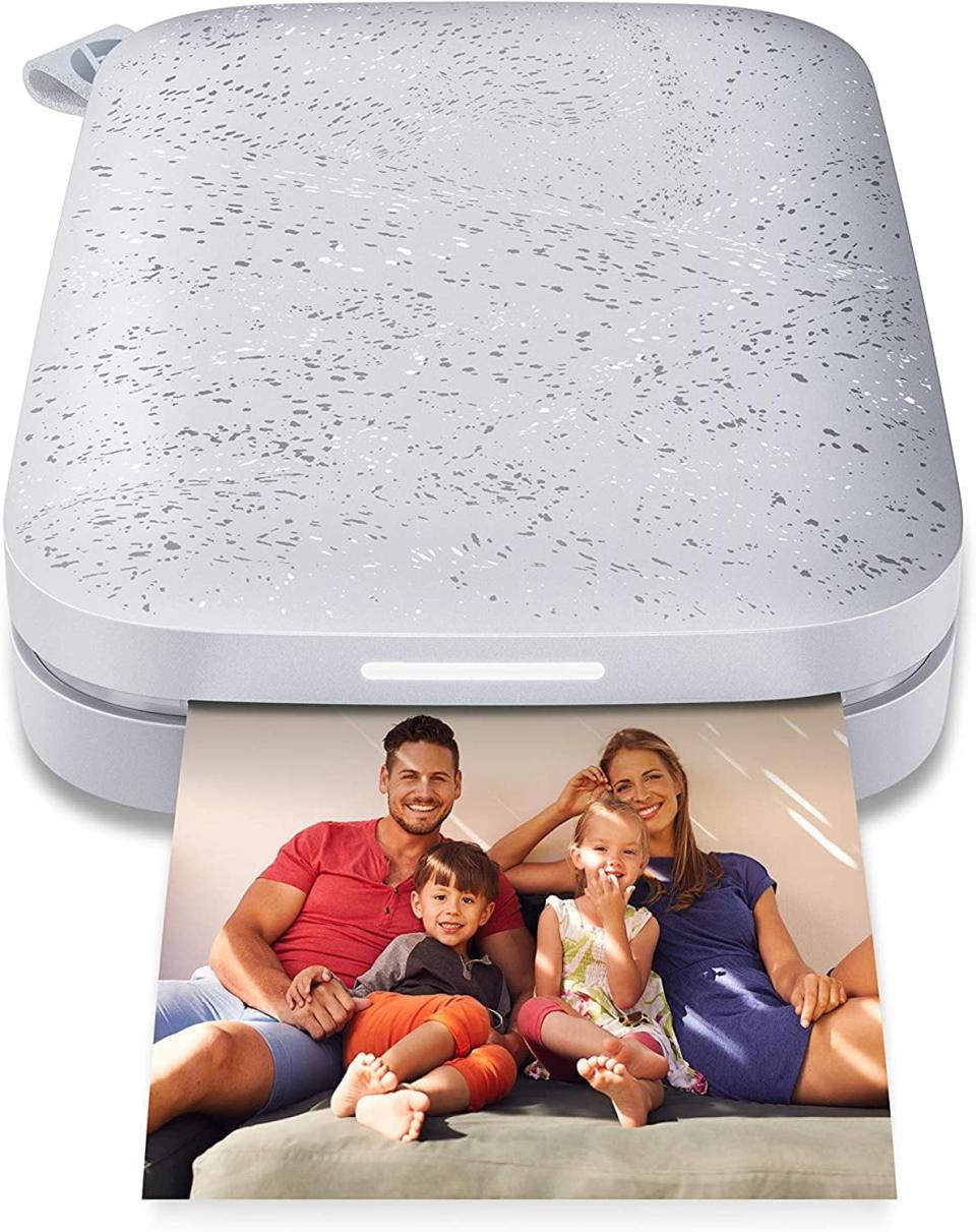 <p>The pictures on their iPhone no longer have to stay in the cloud. Thanks to the <span>HP Sprocket Portable Instant Photo Printer </span> ($80), picture-takers can print out photos instantly and save them in photo albums or scrapbooks to keep for years to come. </p>