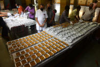 MUMBAI, INDIA - MARCH 26: Food packets being distributed by Kuchhi Visha Oswal Jain Seva, Kurla with support of local corporater Captan Malik for Police, BMC and Hospital Staff during restrications on citizem's movement on account of section 144 due to COVID 19 pandemic, on March 26, 2020 in Mumbai, India. (Photo by Vijayanand Gupta/Hindustan Times via Getty Images)