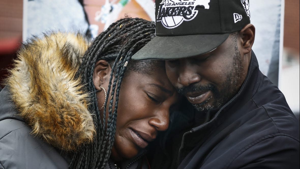 Kenyana Dixon is comforted during a rally for her brother Tyre Nichols at the National Civil Rights Museum on Jan. 16, 2023. (Mark Weber/Daily Memphian via AP, file)