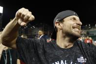 Washington Nationals' Max Scherzer celebrates after Game 4 of the baseball National League Championship Series against the St. Louis Cardinals Tuesday, Oct. 15, 2019, in Washington. The Nationals won 7-4 to win the series 4-0. (AP Photo/Patrick Semansky)