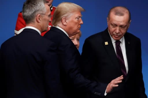 NATO Secretary General Jens Stoltenberg (L) admitted a solution to a dispute with Turkey had still not been found with the country's President Tayyip Erdogan (R)