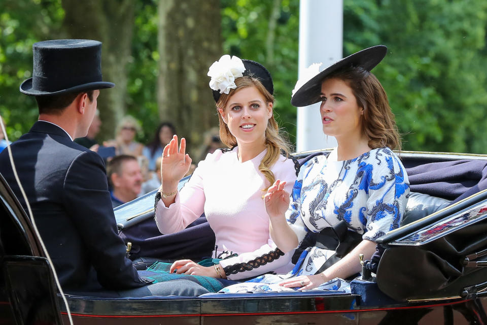 Princess Beatrice of York (L) and Princess Eugenie (R) are seen in a carriage on their way to the Horse Guards Parade during the Trooping the Colour ceremony, which marks the 93rd birthday of Queen Elizabeth II, Britain's longest reigning monarch. (Photo by Dinendra Haria / SOPA Images/Sipa USA)