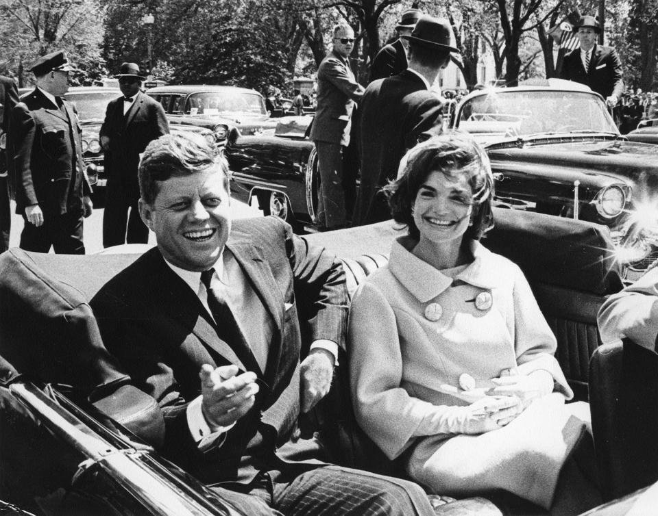 <p>President John F. Kennedy and first lady Jacqueline Kennedy sit in a car in front of Blair House during the arrival ceremonies for Tunisian President Habib Bourguiba, in Washington, May 3, 1961. (Photo: Abbie Rowe/White House/John F. Kennedy Presidential Library and Museum) </p>