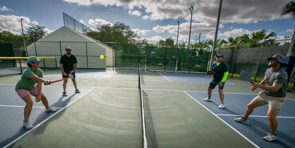 Clockwise left to right, playing a match of pickleball in the pickleball courts at Tropical Park are Yharriz Fernz, Nick Feria, Brian Dreher and Austin Dreher.