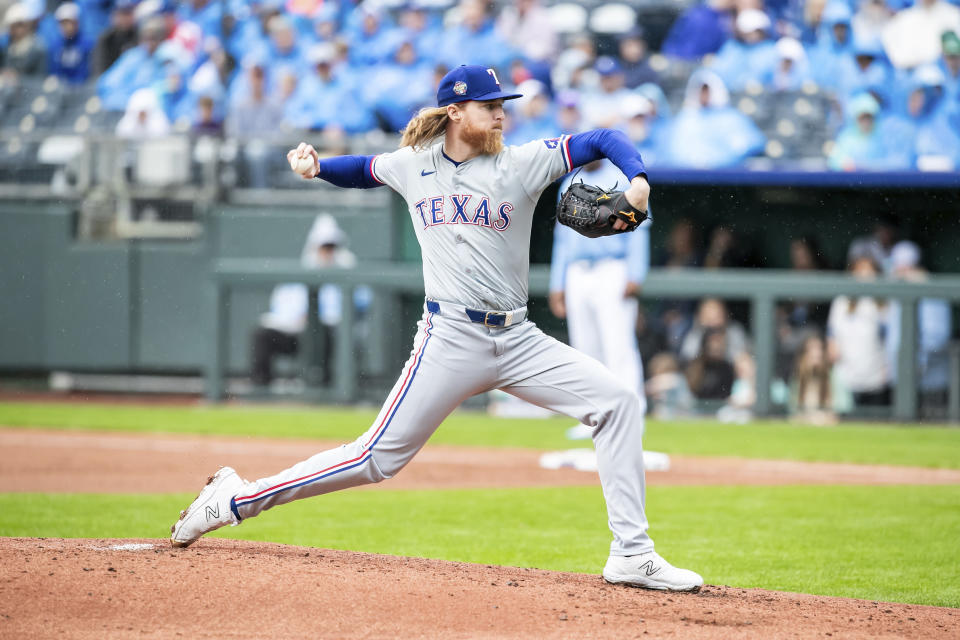 Texas Rangers' pitcher Jon Gray pitches the ball during the first inning of a baseball game against the Kansas City Royals, Sunday, May 5, 2024, in Kansas City, Mo. (AP Photo/Nick Tre. Smith)