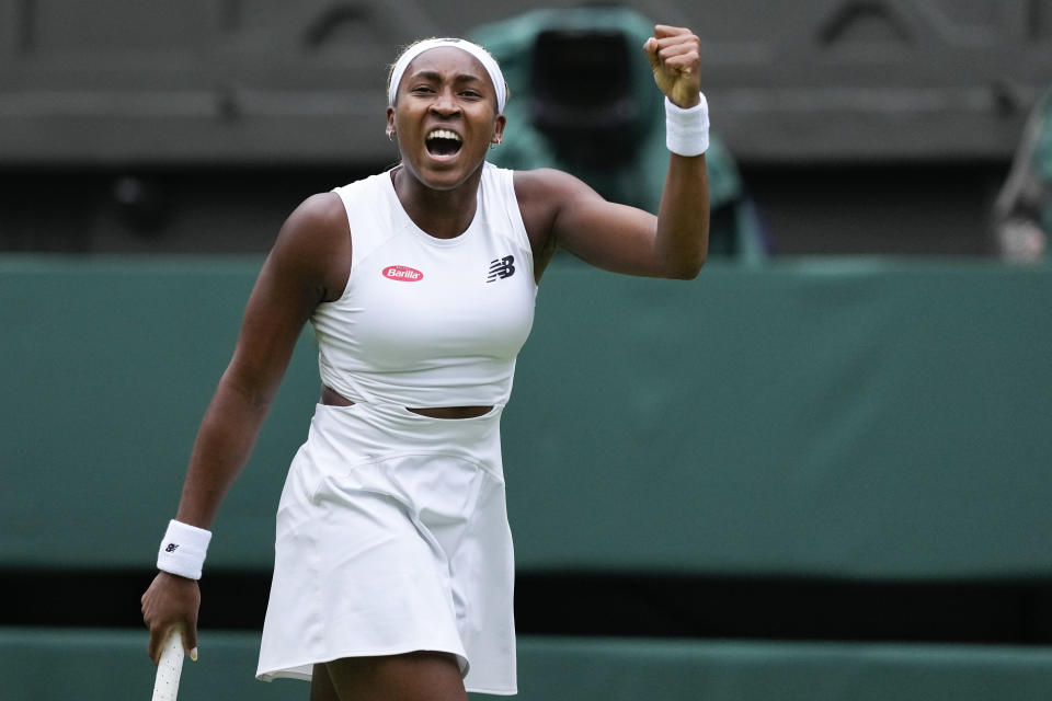 Coco Gauff of the United States reacts after winning a point against compatriot Caroline Dolehide during their first round match of the Wimbledon tennis championships in London, Monday, July 1, 2024. (AP Photo/Alberto Pezzali)