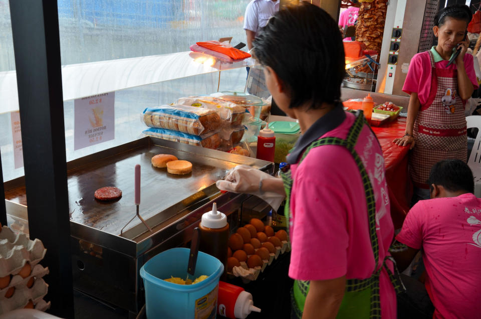 A roadside hawker stall selling burgers in Singapore 