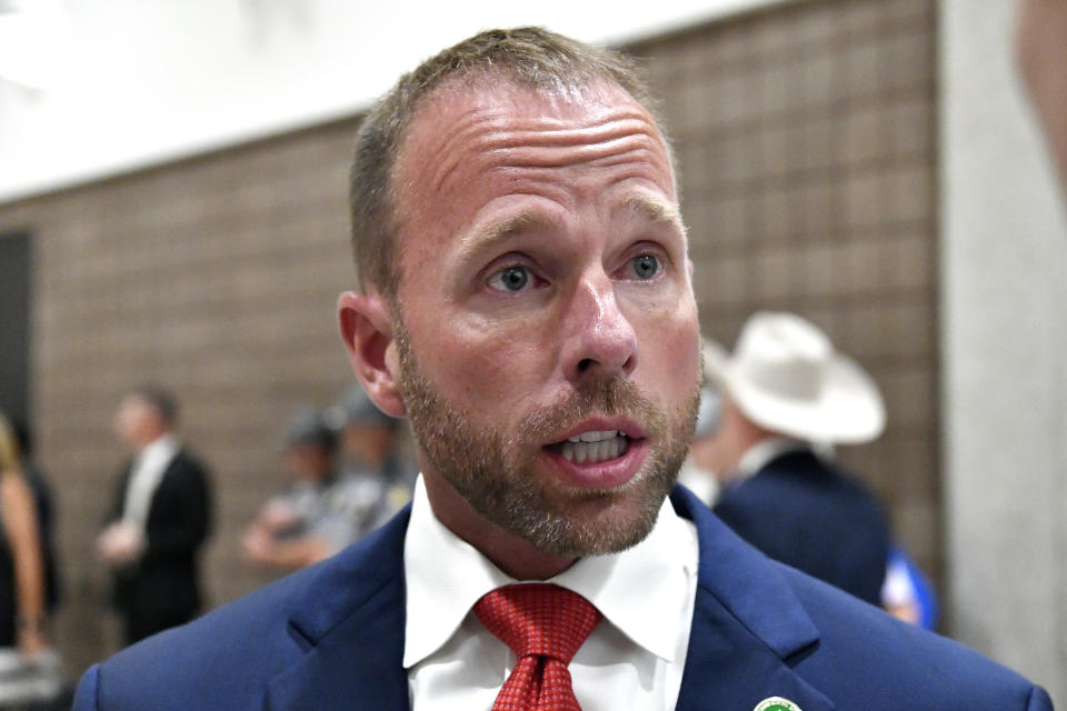 Kentucky state Rep. Robert Goforth, R-East Bernstadt speaks with reporters at the Farm Bureau Ham Breakfast in Louisville, Ky., Thursday, Aug. 22, 2019. Kentucky Governor Matt Bevin this week hurled a dismissive insult at the man he defeated in the May Republican primary. The unorthodox move runs the risk of alienating a large swath of voters Bevin needs to win back in his bid for a second term. While attending the Kentucky Farm Bureau's country ham breakfast on Thursday, Kentucky Gov. Matt Bevin was asked by a WHAS-TV reporter about his ex-rival, Goforth. Bevin replied: "I'm sorry, it's a name so easily forgotten." Now, Goforth says his supporters may not forget the governor's jab come November. (AP Photo/Timothy D. Easley)