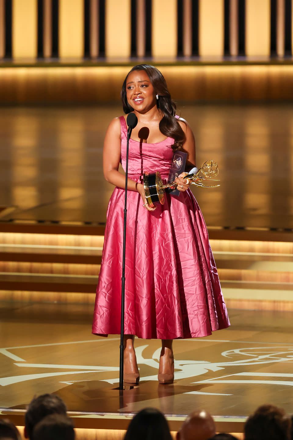 quinta brunson accepts the outstanding lead actress in a comedy series award for abbott elementary