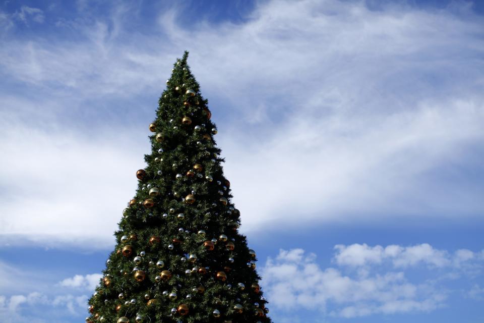 An outdoor artificial Christmas tree is displayed at a shopping center in San Diego, California