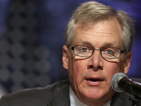 Caterpillar CEO Doug Oberhelman speaks on a panel at the SelectUSA Investment Summit in Washington in this November 1, 2013 file photo. REUTERS/Gary Cameron/Files